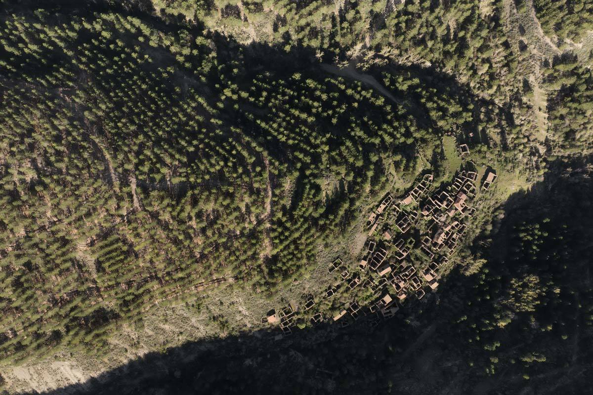 feuntebella, fantomeville #11, spain, 2024 (in 1850 around 150 people lived here on 1120m from goats and sheeps. it had a postal code but no running water, electricity or road connection. the land was sold to a reforestation company so they had to move)