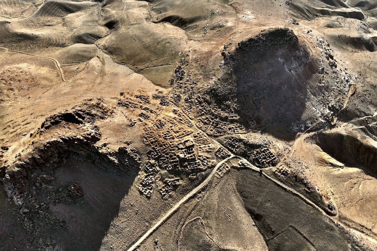 running up that hill, fantomeville #3, turkey, 2023 (village in east anatolia nestled between two mountains. if attacked they could hide in mountain-top caves)